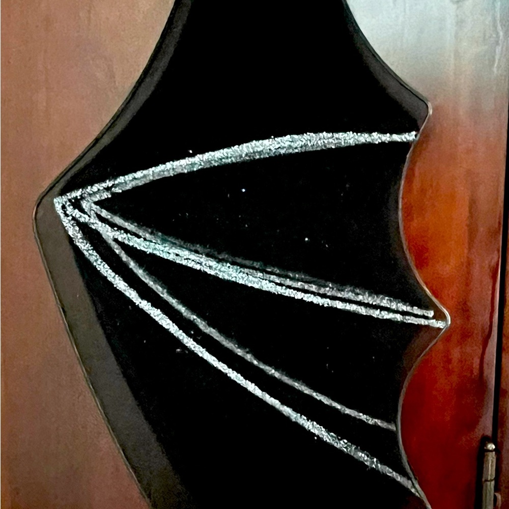 A pair of black Angel wings